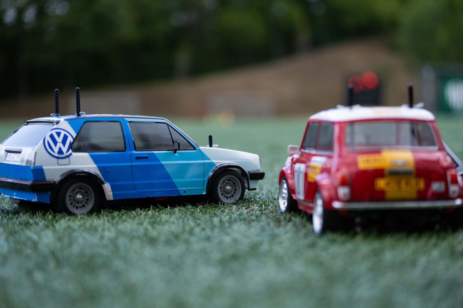 Tamiya VW Golf rally and Mini Cooper RC cars side by side at RC Garage Vienna