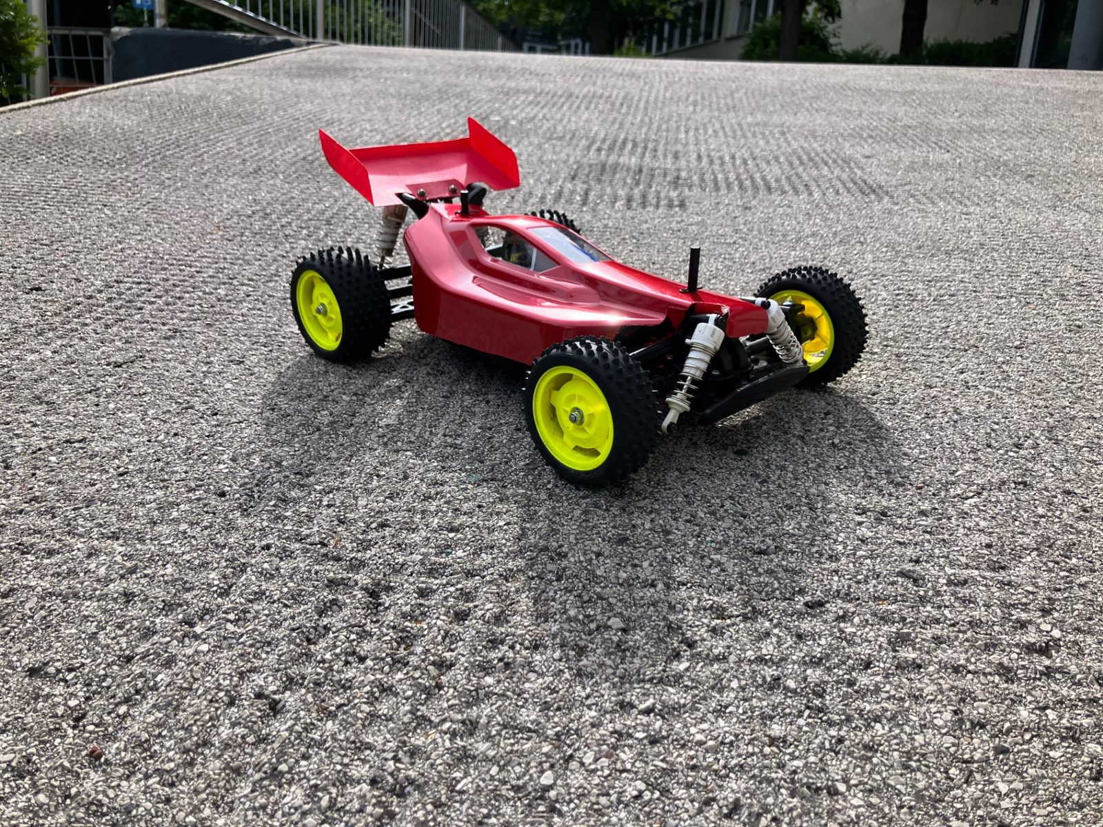 Red custom-painted Tamiya Plasma Edge II RC buggy from RC Garage Vienna