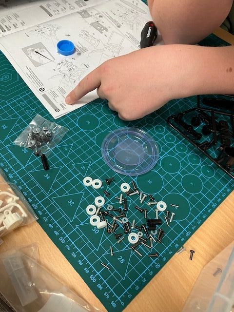 Tamiya RC car parts laid out before assembly at RC Garage camp Vienna